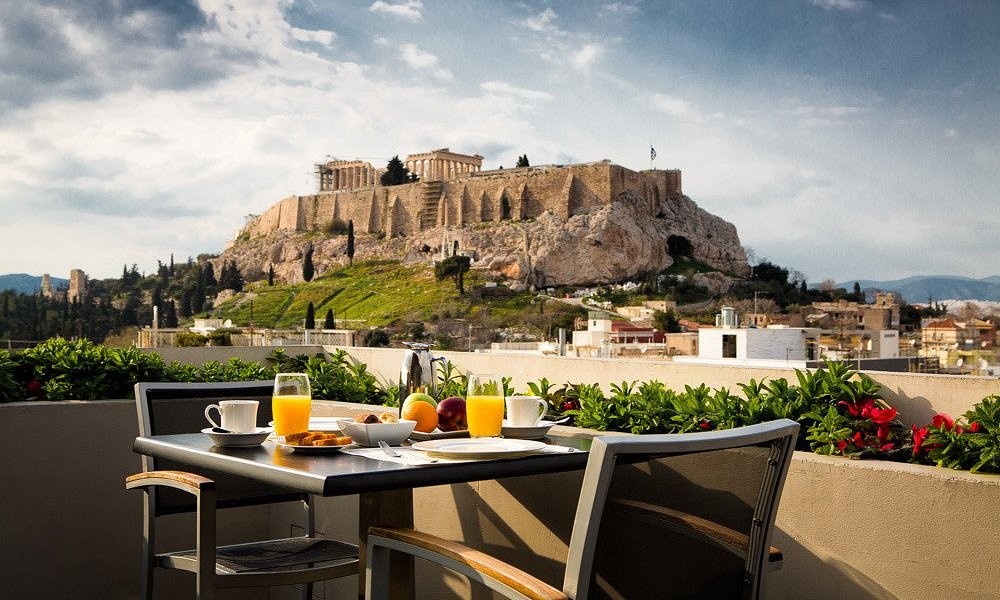 Rooftop breakfast at The Athens Gate Hotel, with the Acropolis in view
