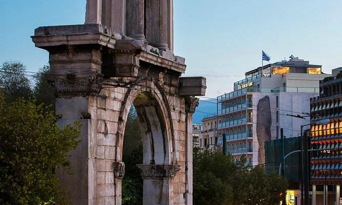 The Arch of Hadrian, with The Athens Gate Hotel visible behind it