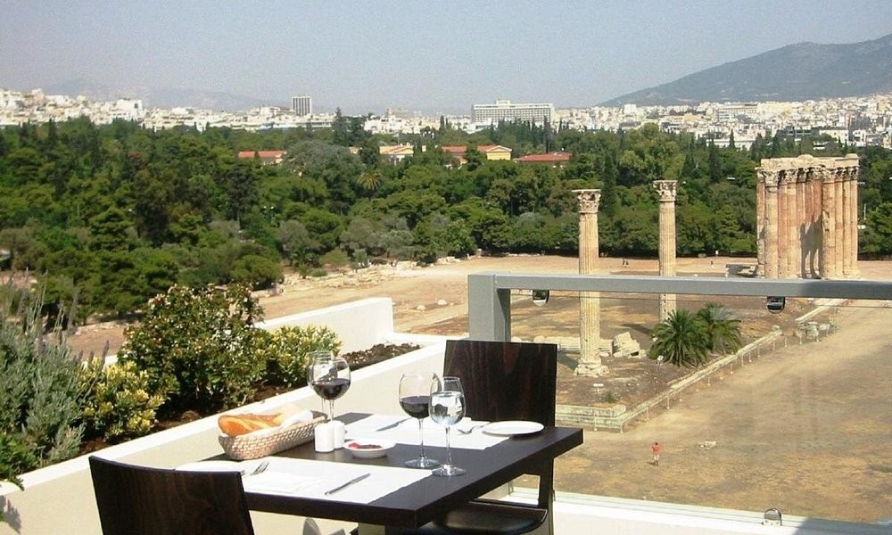 Rooftop lunch at The Athens Gate Hotel, overlooking the Temple of Olympian Zeus