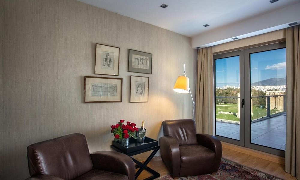 A suite living room at The Athens Gate Hotel, overlooking the Temple of Olympian Zeus