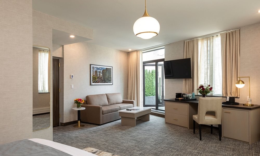 A suite living area at Broadway Plaza Hotel
