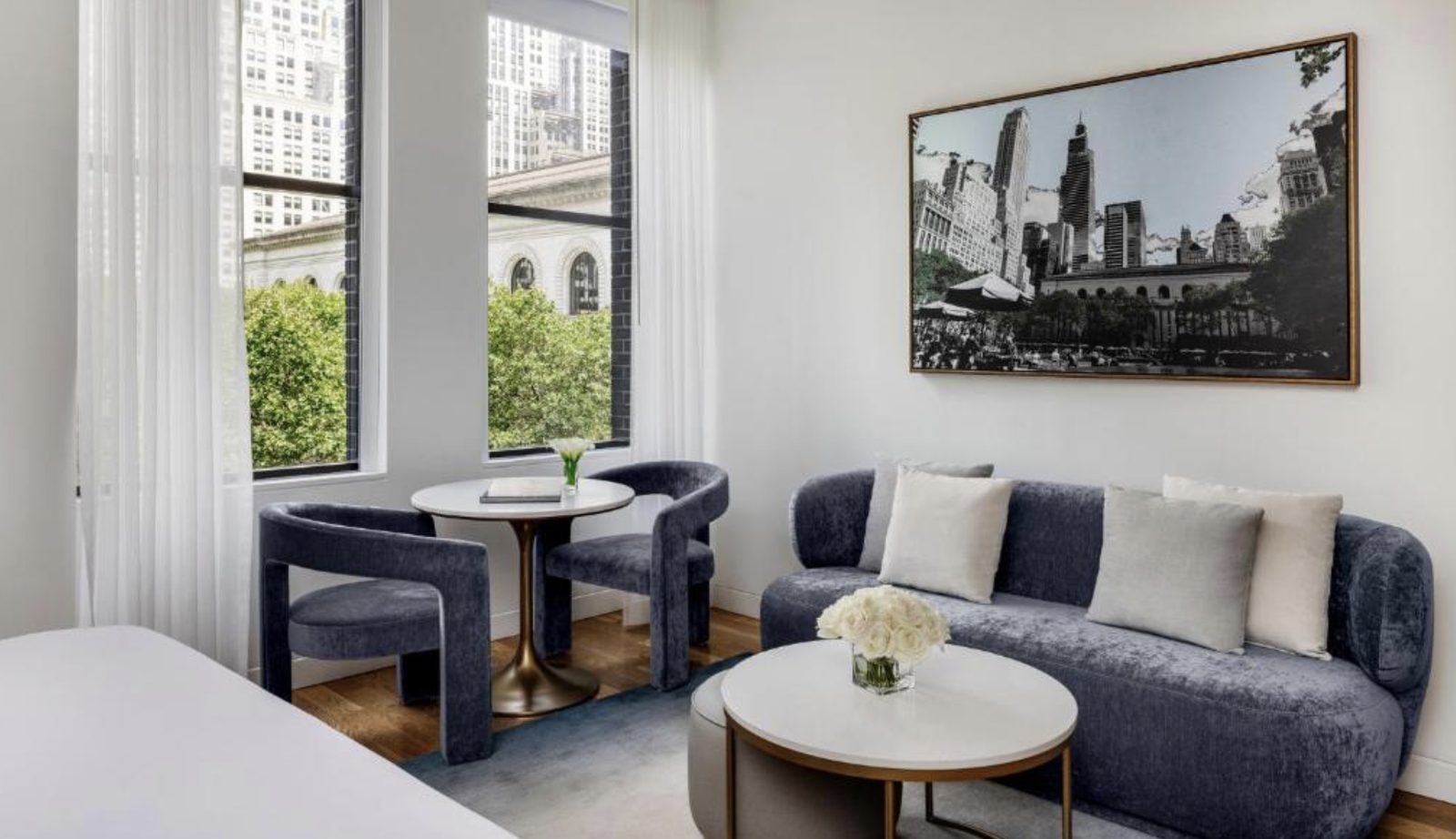 A suite lounge hung with Bryant Park photography