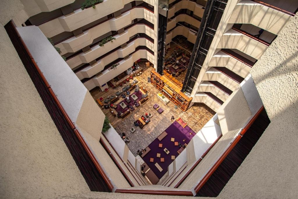 A view down into the atrium lobby at Camino Real Aeropuerto