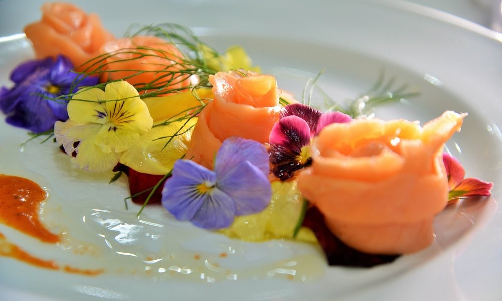 A plated salmon starter at The Capetonian, garnished with edible flowers