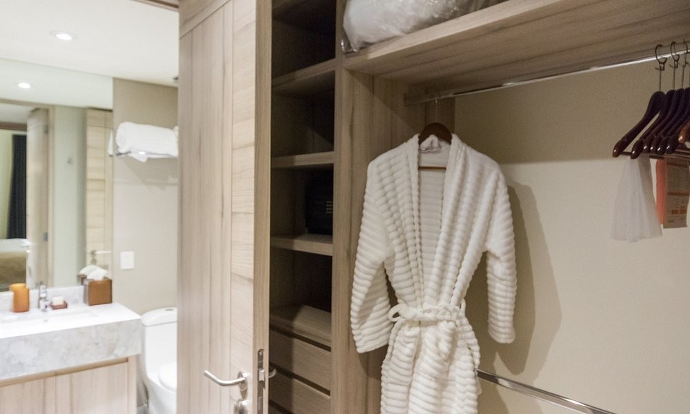 A guest room closet at Casa Malí by Dominion