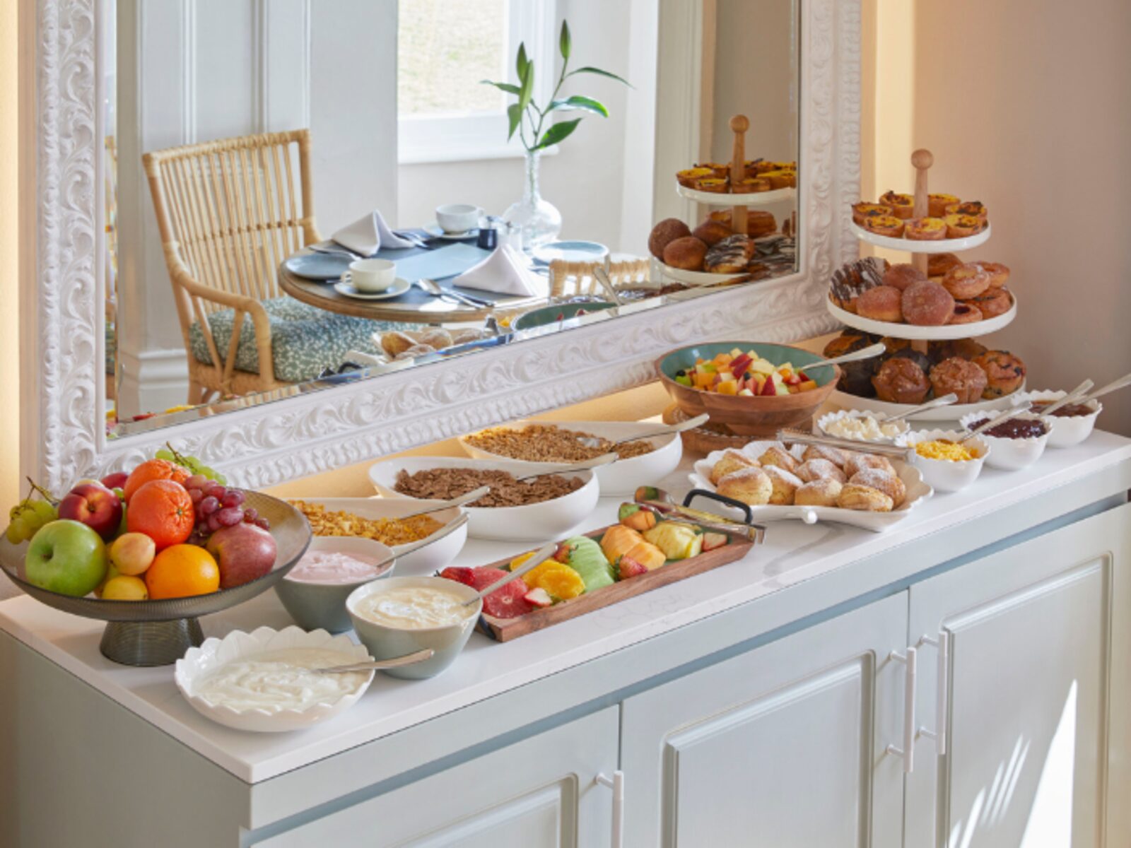 A breakfast spread of fruit, pastries and cereals at Dock House