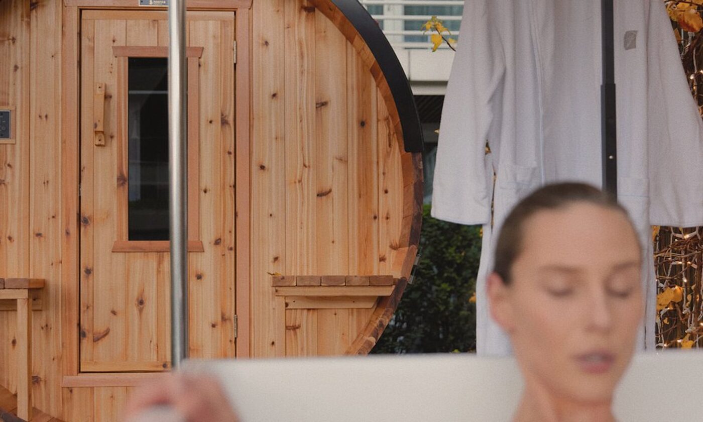 A cedar barrel sauna on the spa terrace