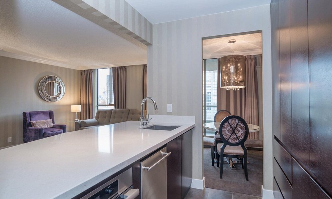 A full kitchen in a suite at La Grande Résidence