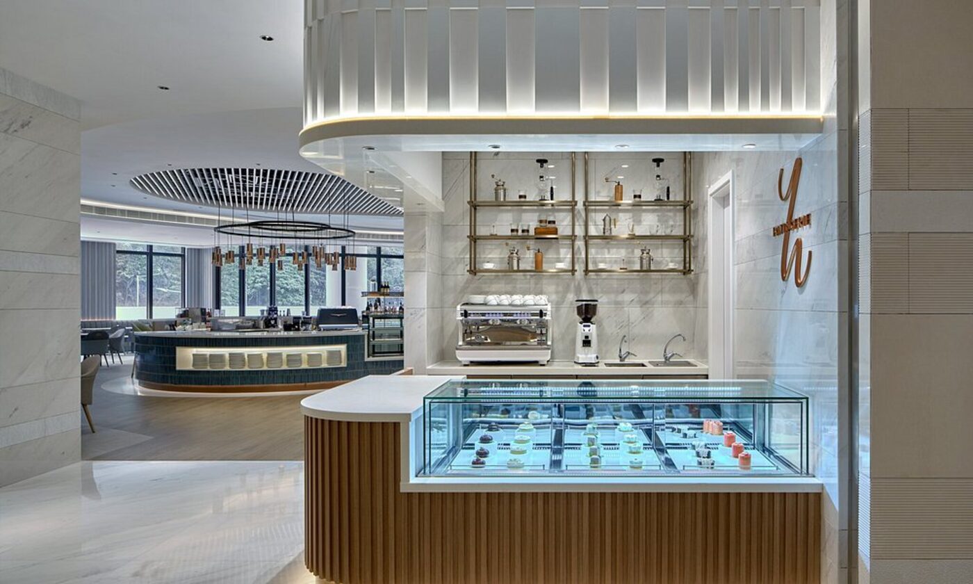 Café counter with pastries and espresso bar