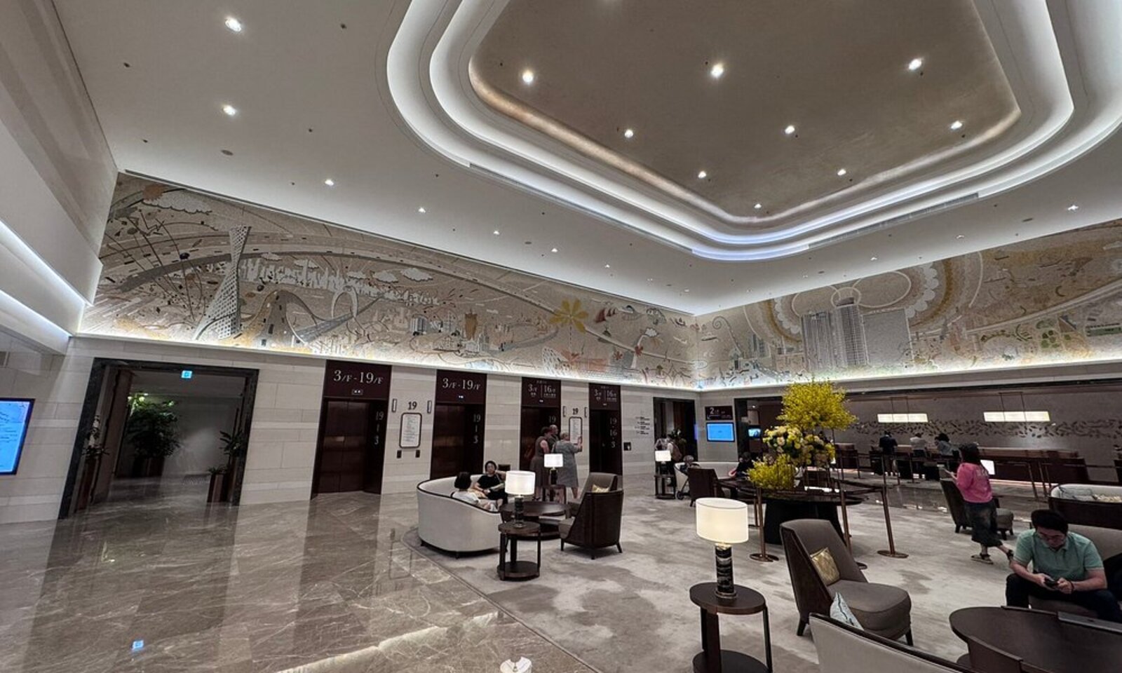 Lobby with mosaic city mural at Hopewell Hotel