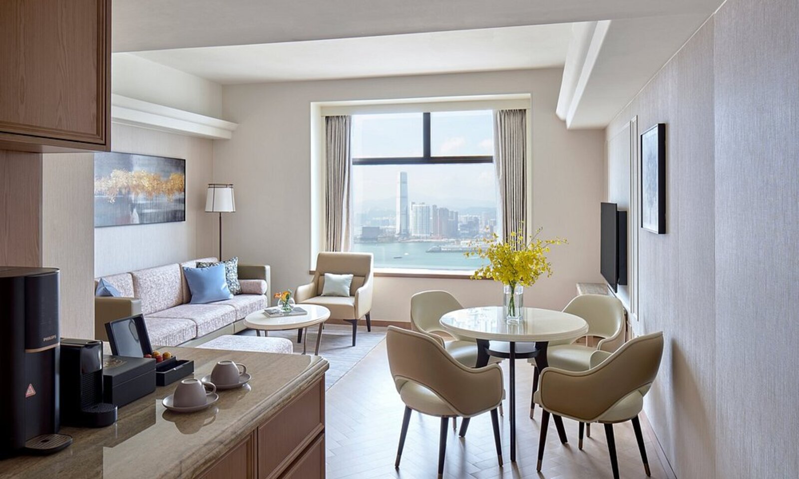 Suite window overlooking the Kowloon skyline and harbour