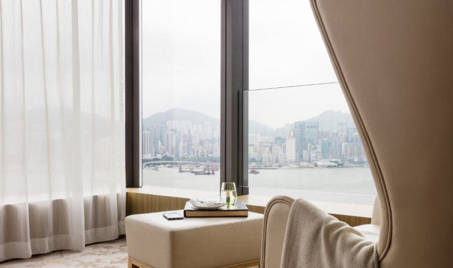 The harbour and Hong Kong Island skyline framed from a guest room