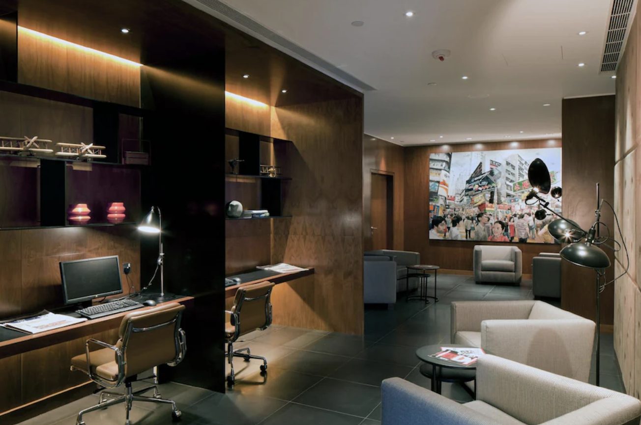 The residents' lounge and library with its Hong Kong street mural