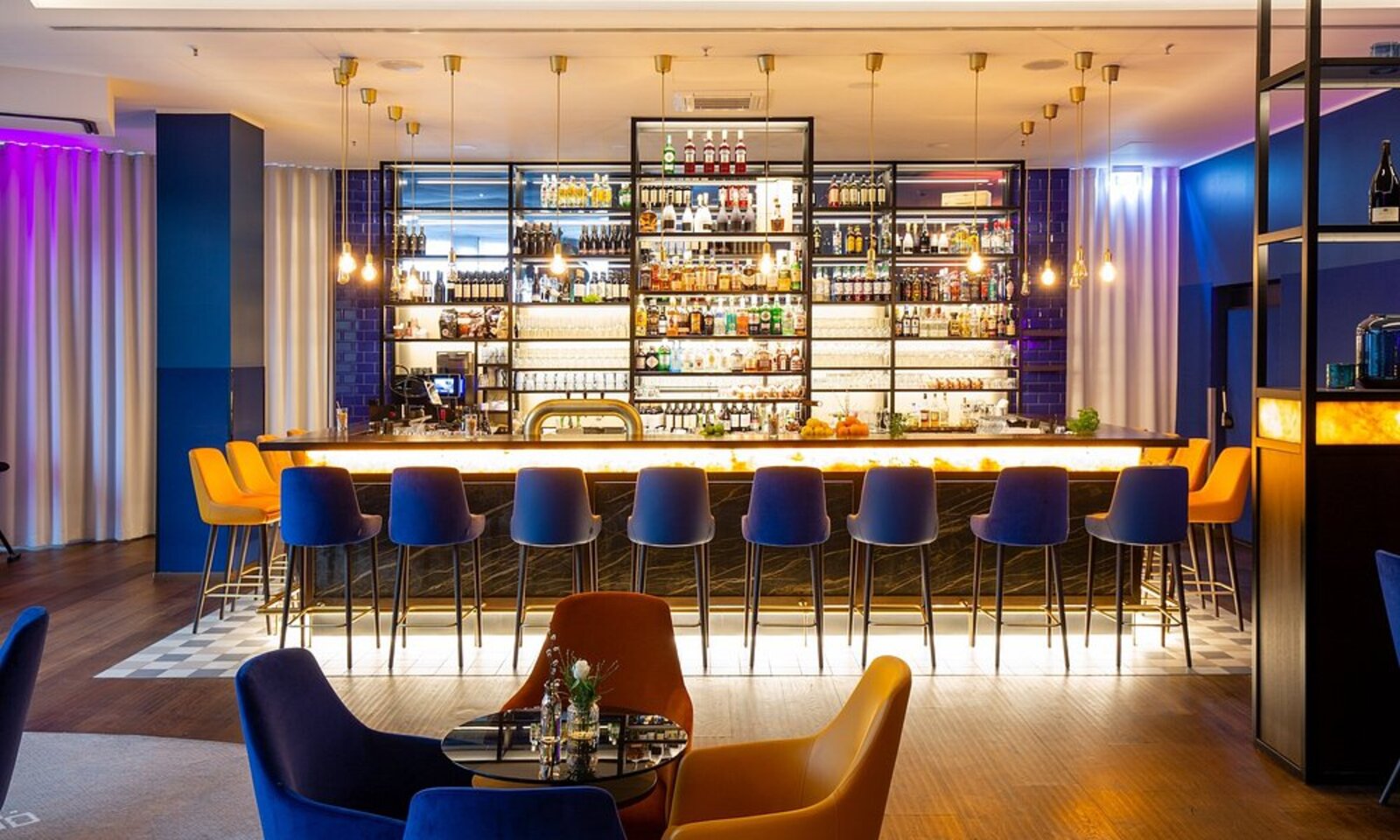 MOA Berlin's cocktail bar and club lounge in the evening