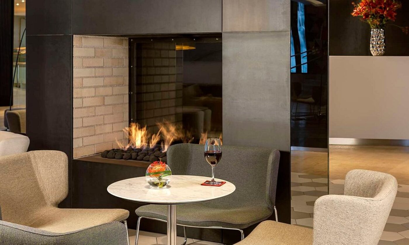 A fireside lounge nook in the hotel bar