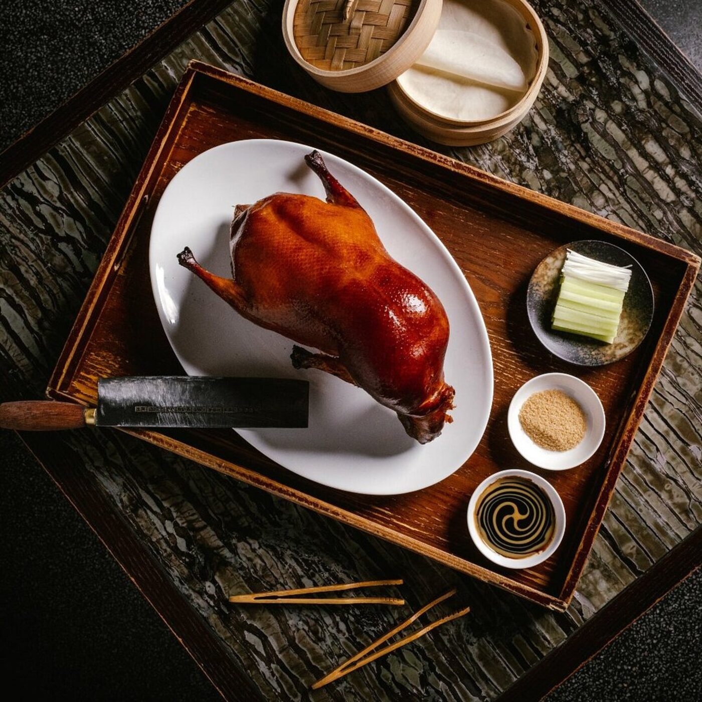 A whole roast duck presentation at one of the hotel's restaurants