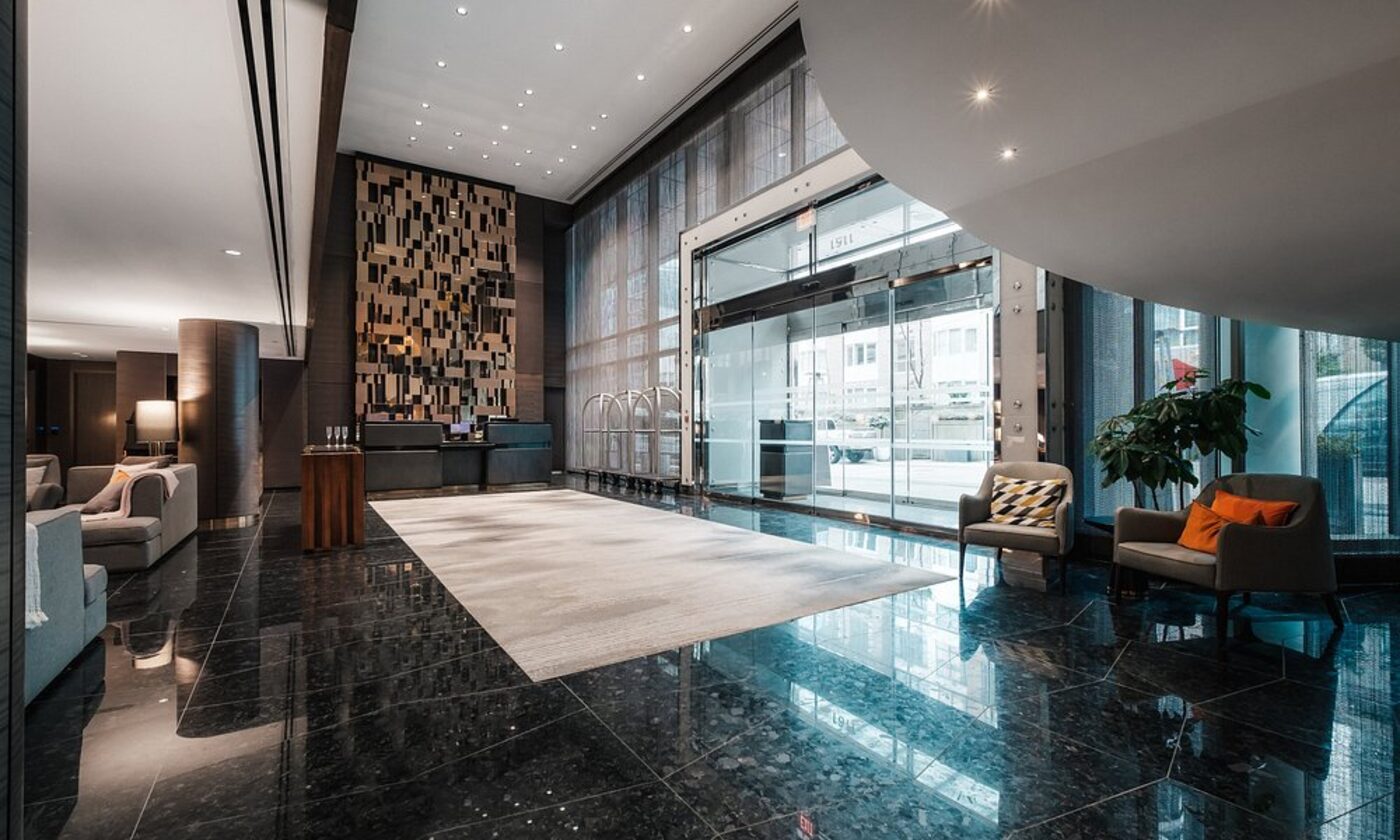 A hotel lobby entrance with warm evening light