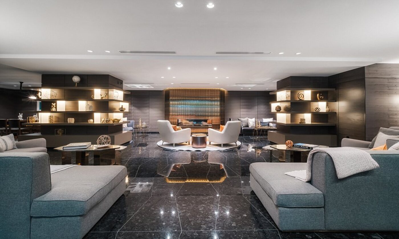 A dark marble lounge with reflective floors