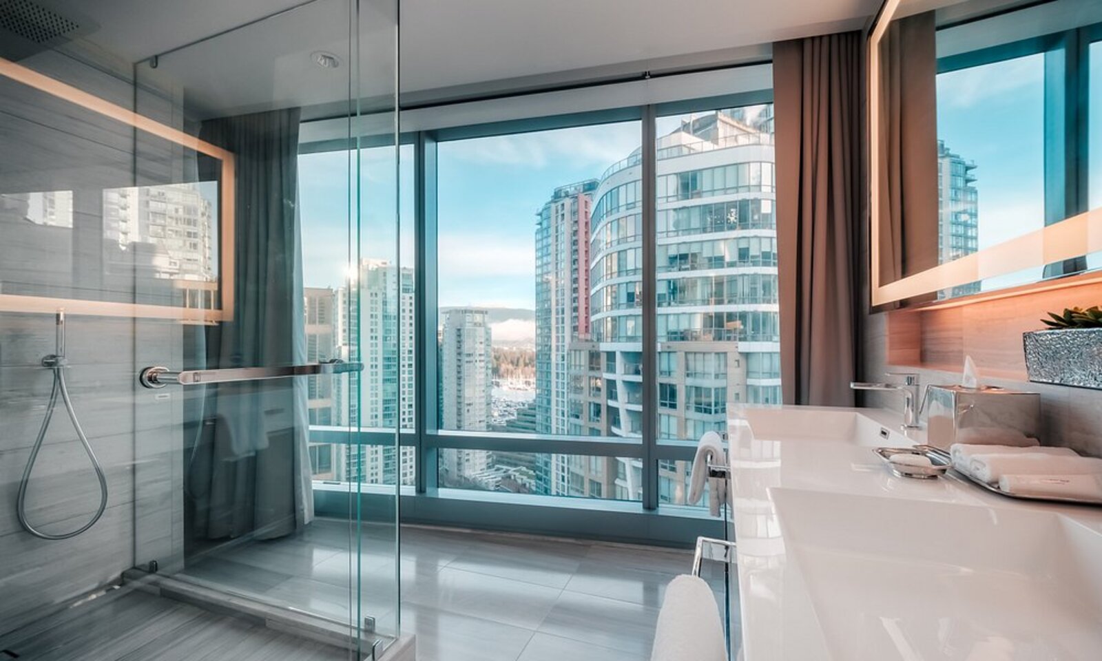 The downtown Vancouver skyline seen from a high floor at Paradox Hotel Vancouver