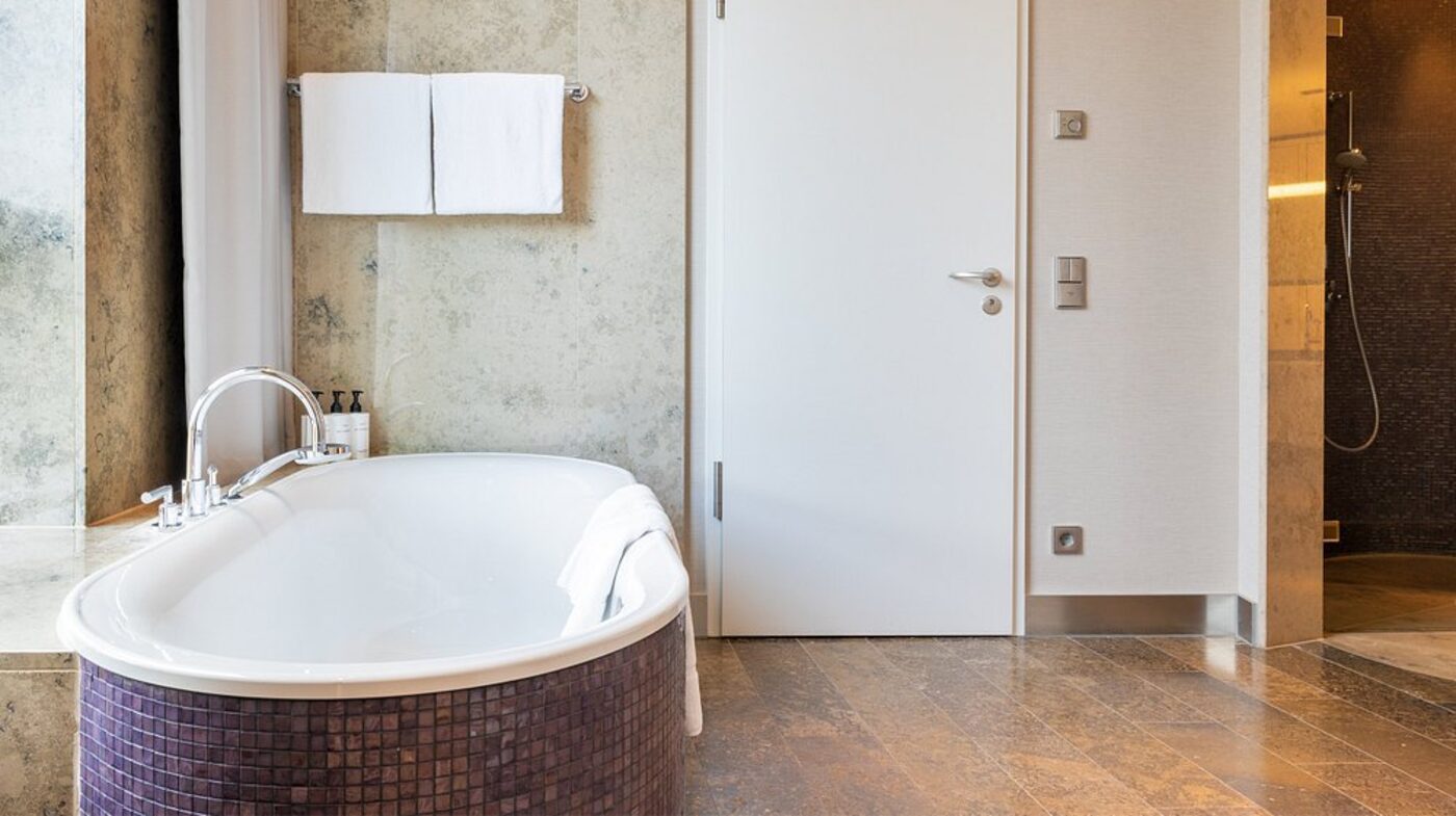 Suite bedroom with a wet bar