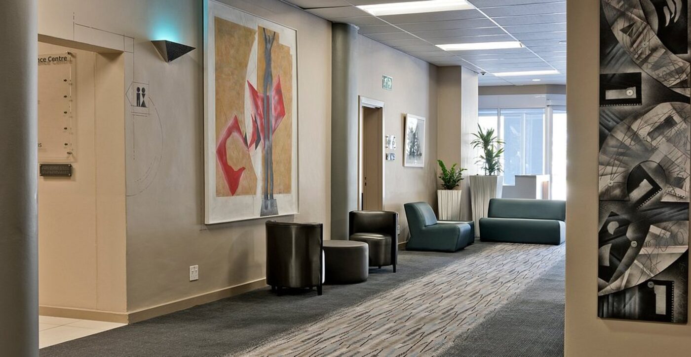 Art-lined corridor near the lobby