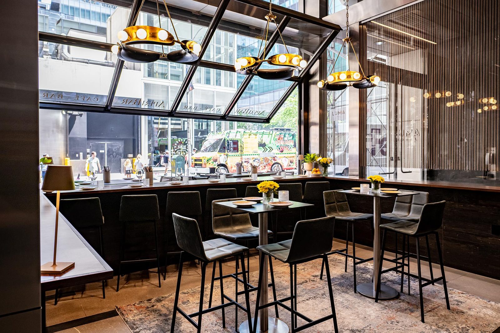 AperiBar's sunlit dining room, opening onto the Midtown street