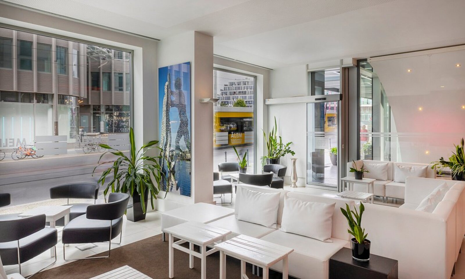 Lounge lobby with street views at Meliá Berlin