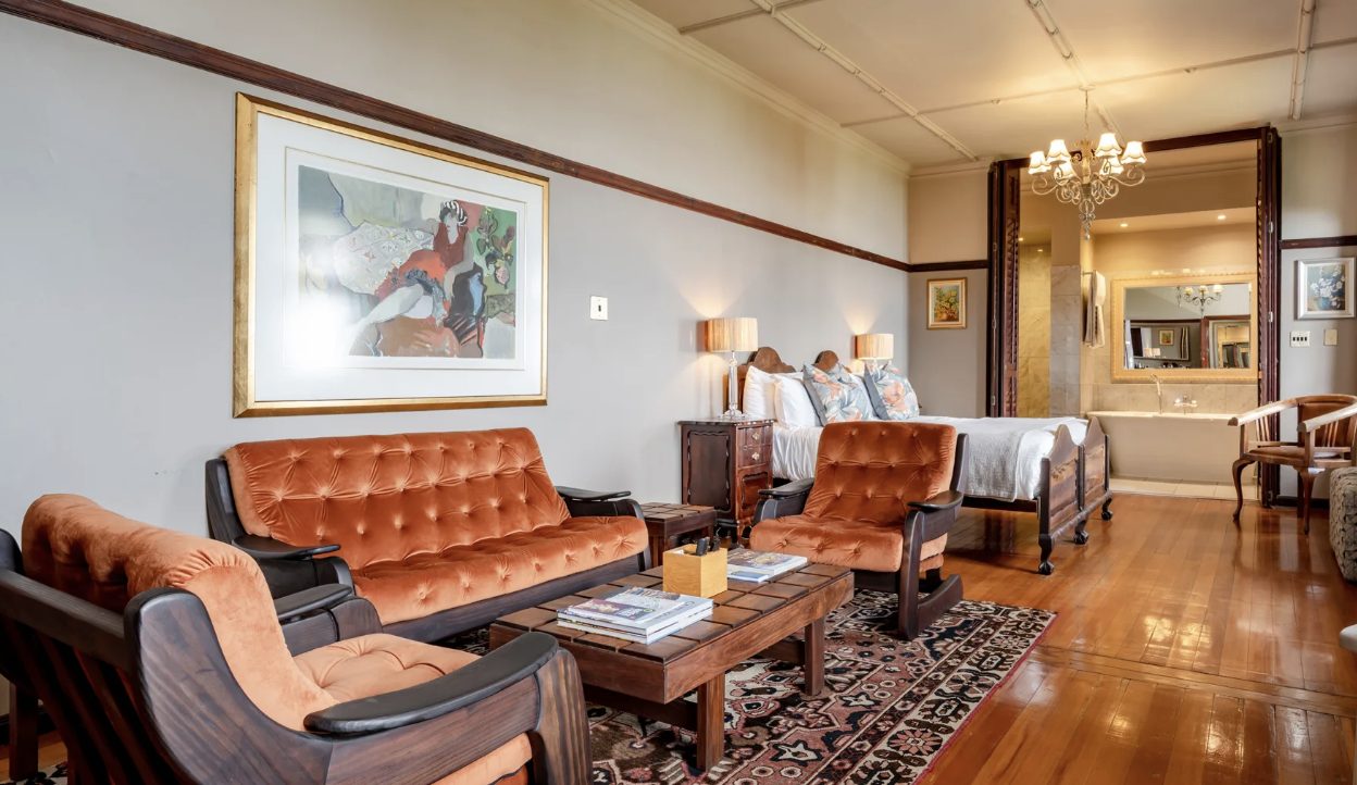 A suite's sitting area, hung with original artwork