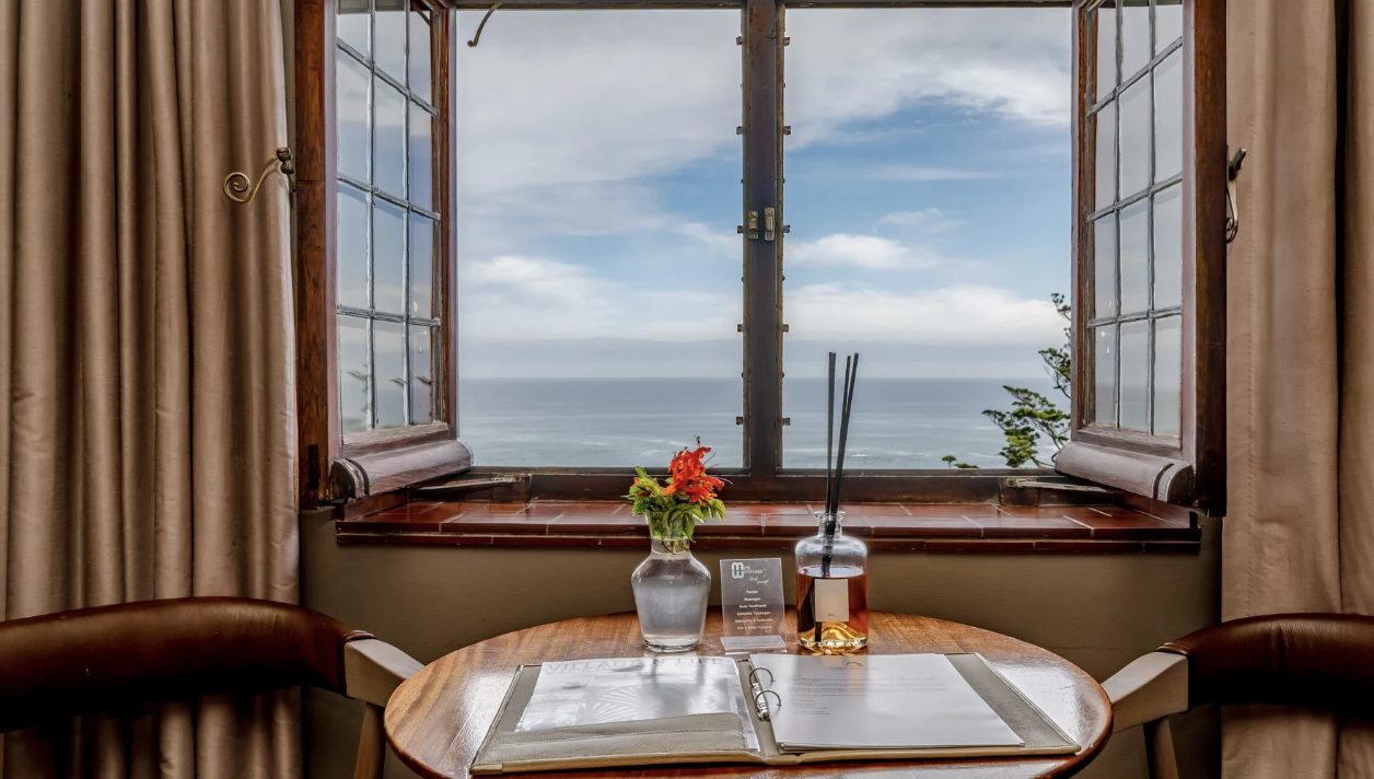 A window table framing the open ocean